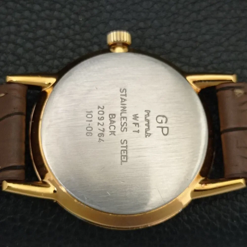 Vintage 1987 HMT Manual Wound Mens Gold Watch & Red accents
